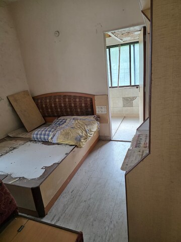 Bedroom in 2 BHK Apartment at Nandavan CHS, Vile Parle East – for Rent