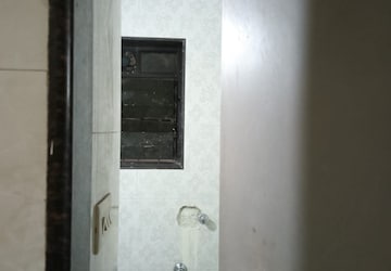 Bathroom in 2 BHK Apartment at Adarsh CHS Vasant Vihar, Vasant Vihar – for Sale