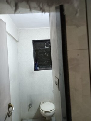 Bathroom in 2 BHK Apartment at Adarsh CHS Vasant Vihar, Vasant Vihar – for Sale