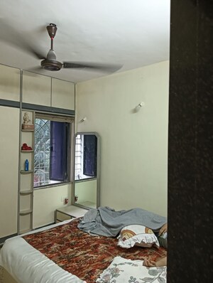 Bedroom in 2 BHK Apartment at Adarsh CHS Vasant Vihar, Vasant Vihar – for Sale