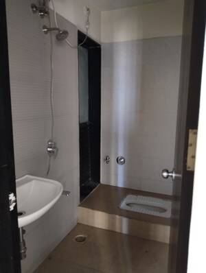 Bathroom in 2 BHK Apartment at Nice Park, Shilphata – for Sale