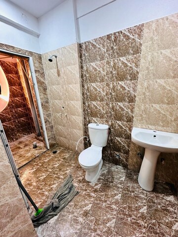 Bathroom in 3 BHK Apartment at Prateek Grand City, Siddharth Vihar – for Rent