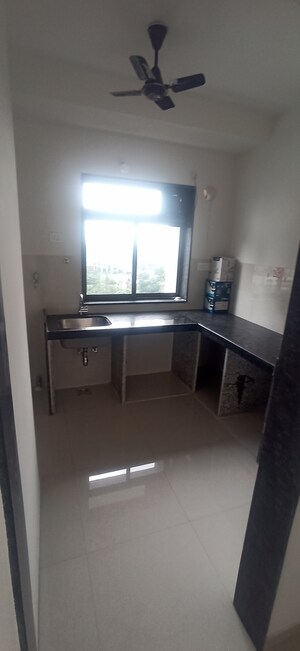 Kitchen in 1 BHK Apartment at Runwal Eirene, Balkum Pada – for Sale