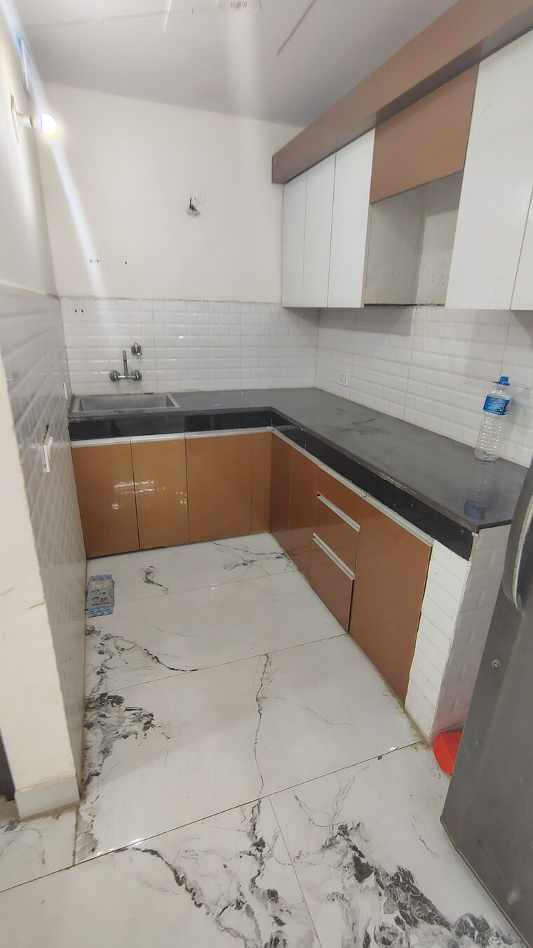 Kitchen, dwarka mor 2 Bedroom 540 Sq.Yd. Builder Floor In Dwarka Mor Delhi 9343982