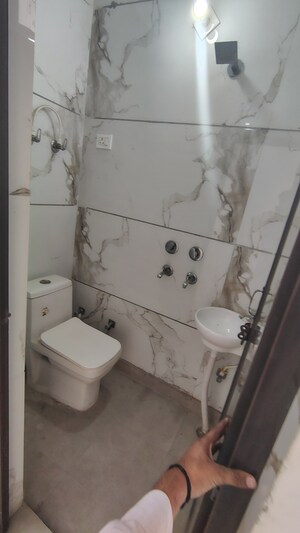 Bathroom in 2 BHK Builder Floor at Dwarka Mor – for Rent