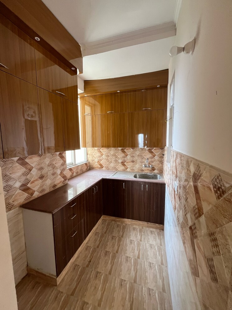 Kitchen, amrapali-golf-homes 3 Bedroom 1115 Sq.Ft. Apartment In Haibatpur Greater Noida 9344043