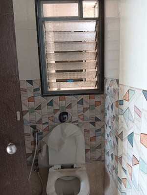 Bathroom in 1 BHK Apartment at Regency Estate, Dombivli East – for Rent