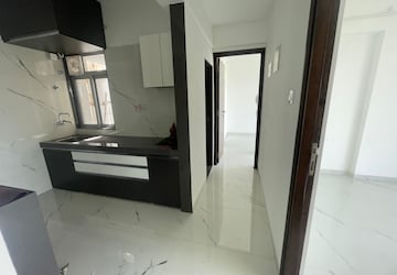 Building Lobby in 2 BHK Apartment at Mansarovar Pearl Gardens, Vasai West – for Rent