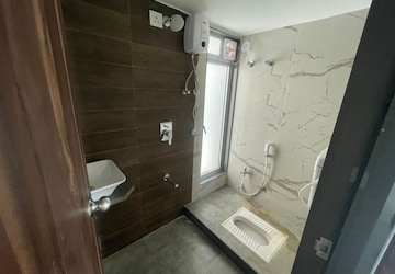 Bathroom in 2 BHK Apartment at Mansarovar Pearl Gardens, Vasai West – for Rent