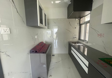 Kitchen in 2 BHK Apartment at Mansarovar Pearl Gardens, Vasai West – for Rent