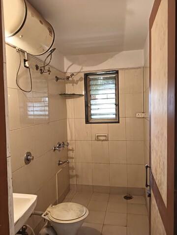 Bathroom in 4 BHK Apartment at Windsor Garden Enclave, Vasant Vihar – for Rent