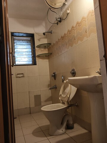 Bathroom in 4 BHK Apartment at Windsor Garden Enclave, Vasant Vihar – for Rent