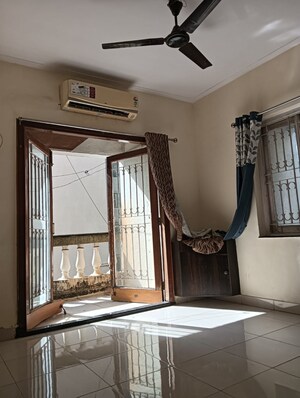 Living Room in 4 BHK Apartment at Windsor Garden Enclave, Vasant Vihar – for Sale