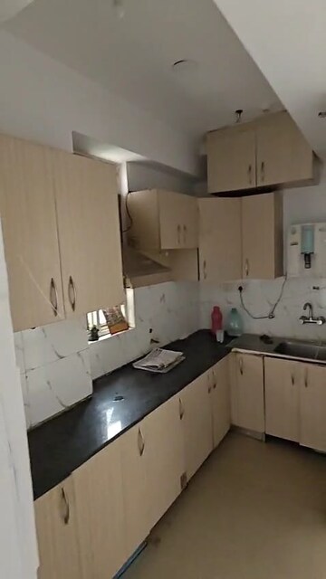 Kitchen in 2 BHK Apartment at Supertech Cape Town, Sector 74 – for Sale
