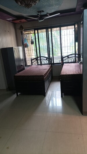 Bedroom in 2 BHK Apartment at Swastik Regalia, Waghbil – for Rent