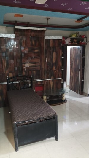 Bedroom in 2 BHK Apartment at Swastik Regalia, Waghbil – for Rent