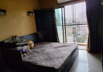 Bedroom in 3 BHK Apartment at Shiv Shakti CHS Andheri, Andheri West – for Sale