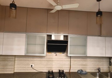 Kitchen in 3 BHK Apartment at ABA Cleo County, Sector 121 – for Rent