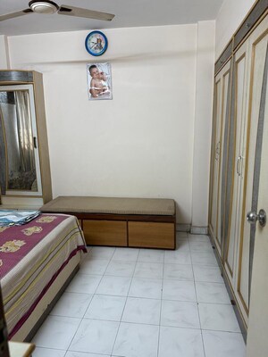Bedroom in 1 BHK Apartment at Swastik Park CHS, Brahmand – for Sale