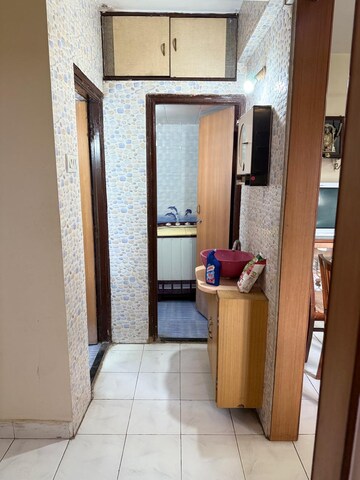 Building Lobby in 1 BHK Apartment at Swastik Park CHS, Brahmand – for Sale