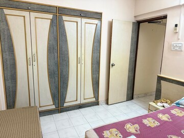 Bedroom in 1 BHK Apartment at Swastik Park CHS, Brahmand – for Sale