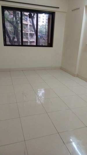 Living Room in 2 BHK Apartment at Riddhi Garden, Malad East – for Rent