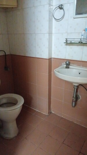 Bathroom in 2 BHK Apartment at Riddhi Garden, Malad East – for Rent