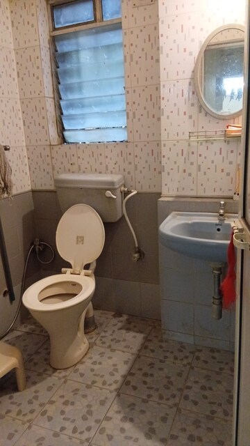 Bathroom in 2 BHK Apartment at Riddhi Garden, Malad East – for Rent