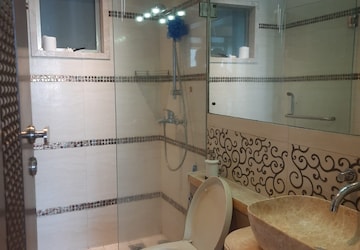 Bathroom in 3 BHK Apartment at Oberoi Springs, Andheri West – for Sale