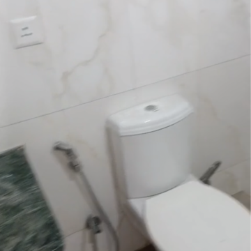 Bathroom in  Office Space at DLF My Pad, Vibhuti Khand – for Rent