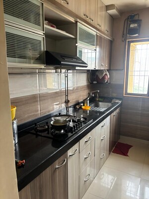 Kitchen in 1.5 BHK Apartment at Siddheshwar Arcade, Kavesar – for Sale