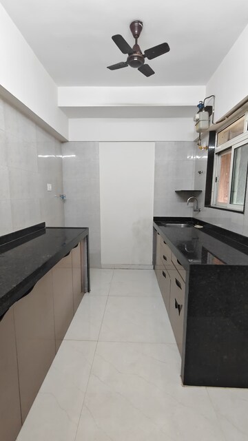 Kitchen in 2 BHK Apartment at Chandak 34 Park Estate, Goregaon West – for Rent