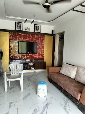 Living Room in 1 BHK Apartment at Mantri Park, Goregaon East – for Rent