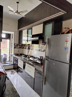 Kitchen in 1 BHK Apartment at Mantri Park, Goregaon East – for Rent