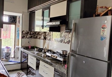 Kitchen in 1 BHK Apartment at Mantri Park, Goregaon East – for Rent