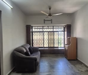Living Room in 4 BHK Apartment at Dheeraj Insignia, Bandra East – for Sale