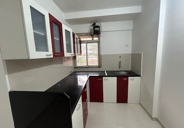 Kitchen in 3 BHK Apartment at Godrej Emerald, Ghodbunder Road – for Rent