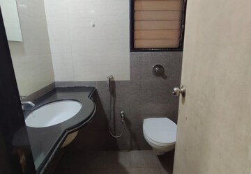 Bathroom in 2 BHK Apartment at Nisarg Hyde Park, Kharghar – for Rent
