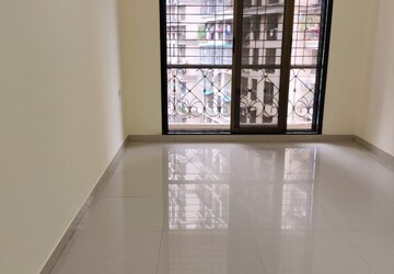 Living Room in 2 BHK Apartment at Nisarg Hyde Park, Kharghar – for Rent