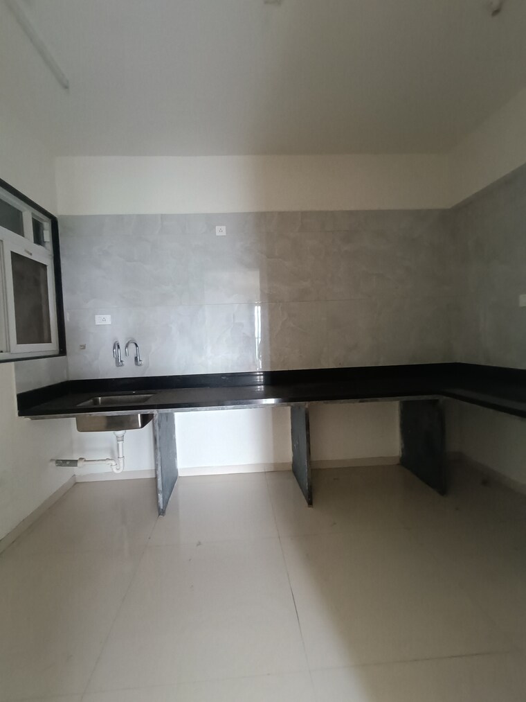Kitchen, bhaktamar-residency 2 Bedroom 781 Sq.Ft. Apartment In Wadgaon Sheri Pune 9345651