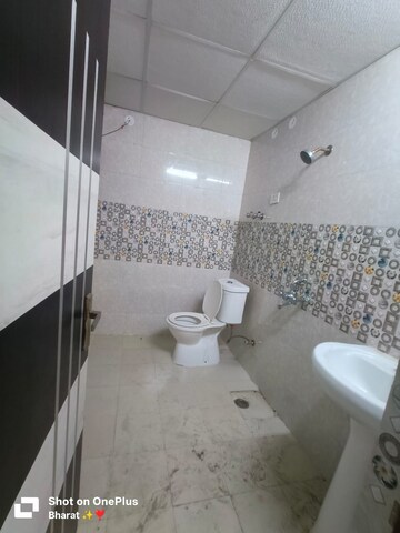 Bathroom in 3 BHK Apartment at Meenal Balmukund Residency, Raj Nagar Extension – for Sale