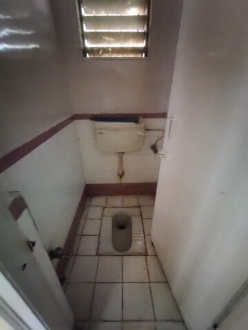 Bathroom in 1 BHK Apartment at Parijat Gardens Marigold CHS, Kasarvadavali – for Rent