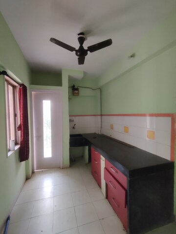 Kitchen in 1 BHK Apartment at Parijat Gardens Marigold CHS, Kasarvadavali – for Rent