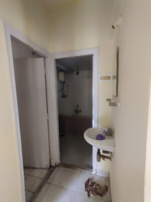 Bathroom in 1 BHK Apartment at Parijat Gardens Marigold CHS, Kasarvadavali – for Rent