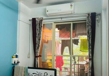 Living Room in 1 BHK Apartment at Regency Estate, Dombivli East – for Rent
