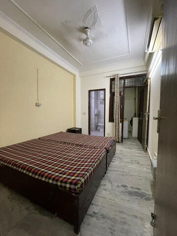 Bedroom in 1 BHK Builder Floor at Palm Residency Chhatarpur, Chattarpur – for Rent