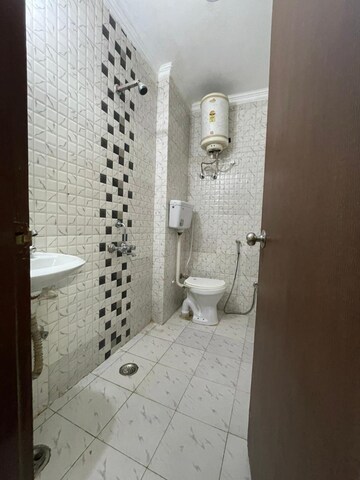 Bathroom in 1 BHK Builder Floor at Palm Residency Chhatarpur, Chattarpur – for Rent