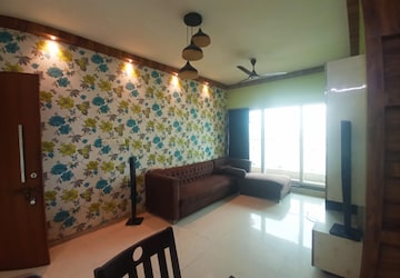 Living Room in 2 BHK Apartment at Rustomjee Urbania, Thane West – for Sale