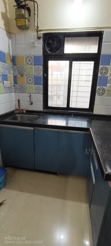 Kitchen in 1 BHK Apartment at Raunak Heights, Ghodbunder Road – for Rent
