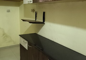 Kitchen in 1 BHK Apartment at Rosa Classique, Kasarvadavali – for Rent